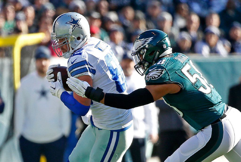 Dallas Cowboys tight end Jason Witten (82) is tackled by Philadelphia Eagles middle...