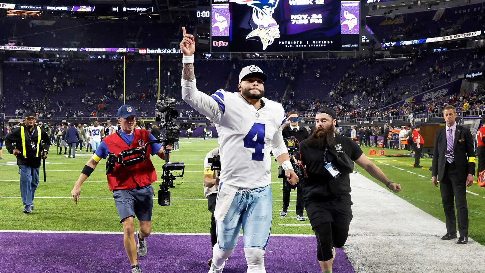 Dallas Cowboys quarterback Dak Prescott (4) celebrates the teams big win over the Minnesota...