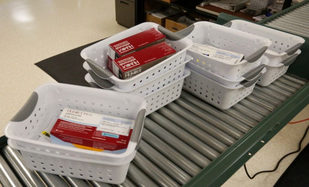An order waits to be filled by a pharmacist at Senderra Specialty Pharmacy Richardson. (Ron...