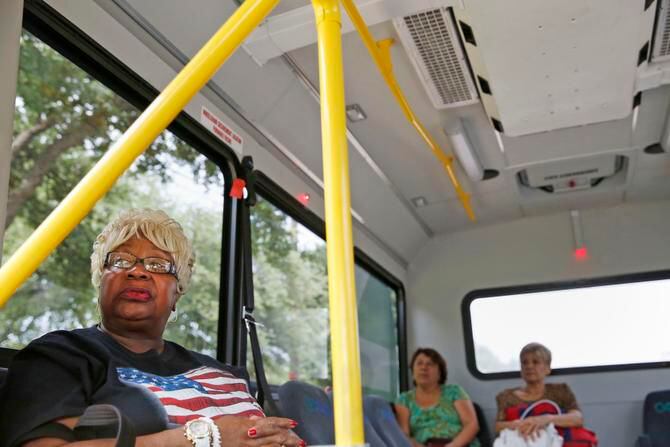 
Jackie Hilliard of McKinney rides a bus on the McKinney blue line, one of two fixed routes...