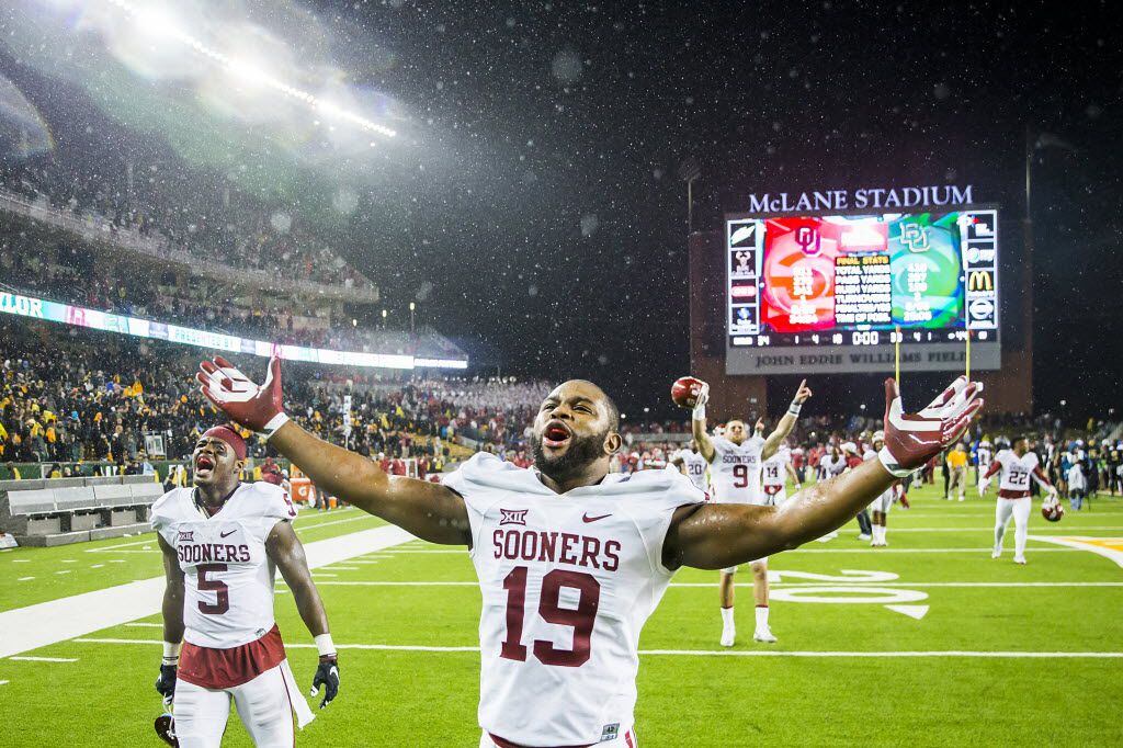 Oklahoma Sooners linebacker Eric Striker (19) celebrates after a 44-34 victory over the...